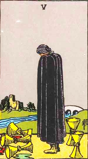 The Five of  Cups Tarot Card.  
Standing alone, shrouded in a dark cloakn, stands a figure.  At his feet are 5 cups: three in front of him, which have spilled, their contents puddling on the ground beneath them, and two behind him, fully upright, and presumably still full.  While the cups before him are spilled, behind him are two full ones…he has only to turn and shift perspective to see that he still has plenty.   In front of him we see a river, and on a bluff on the other side of the river a lone fortress or dwelling.  There is a bridge with two arches spanning the river a short distance to the right of the figure.  

